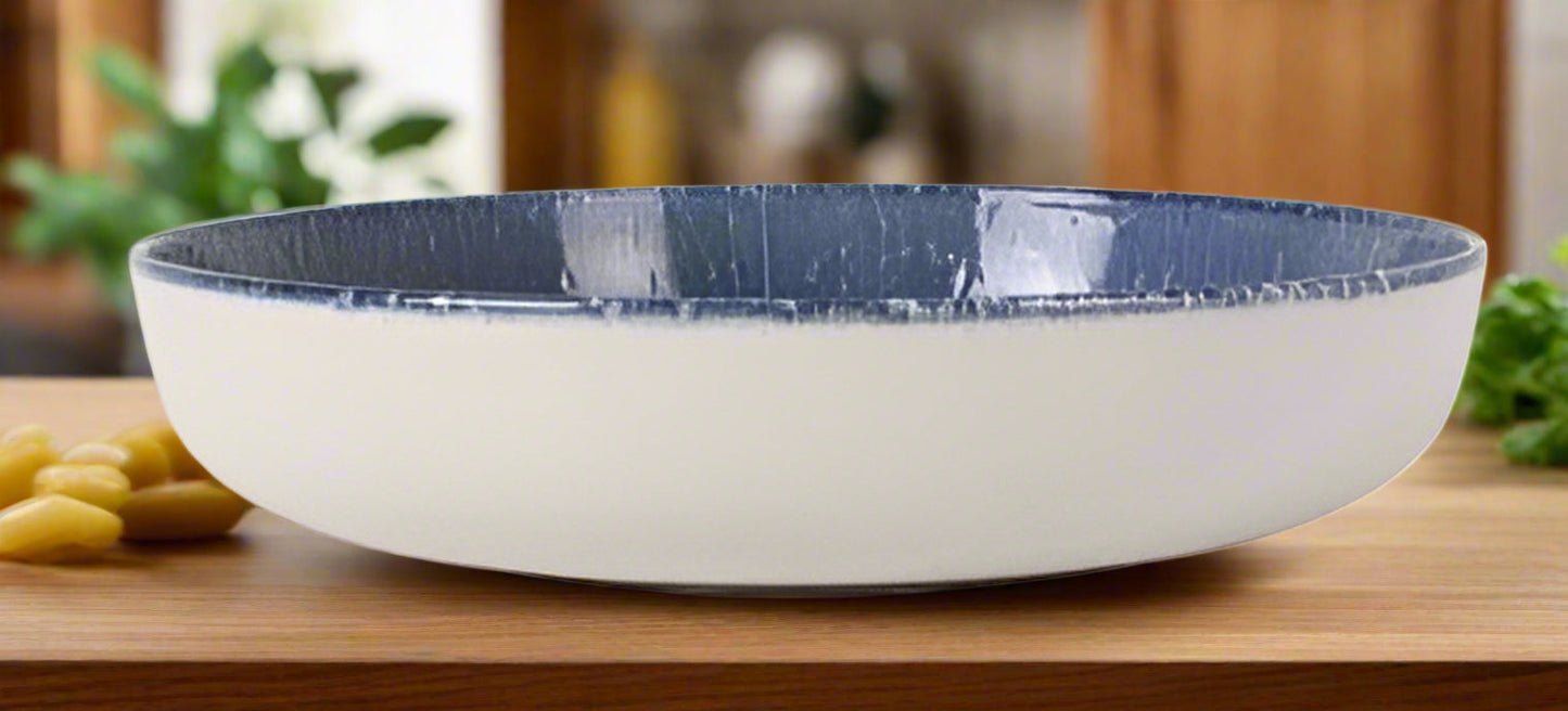 White ceramic Nordic Olaf 23cm Stoneware Pasta Bowl with blue textured rim