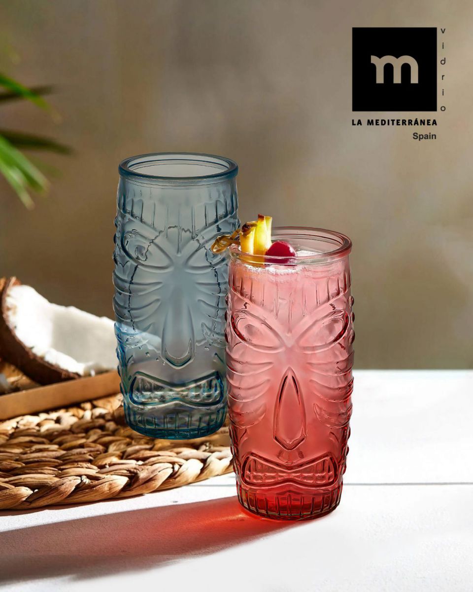 Colorful Tiki Highball glasses in blue and red with beverages and garnishes