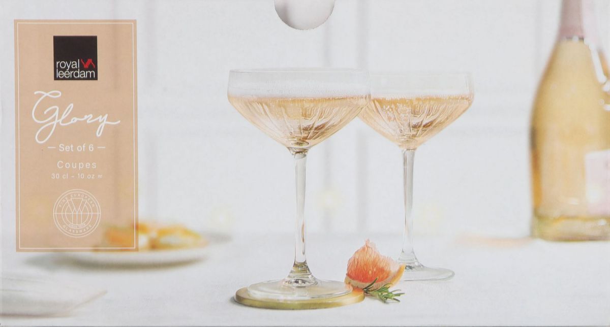 Two Vintage Royal Leerdam Glory coupe glasses filled with sparkling pink wine