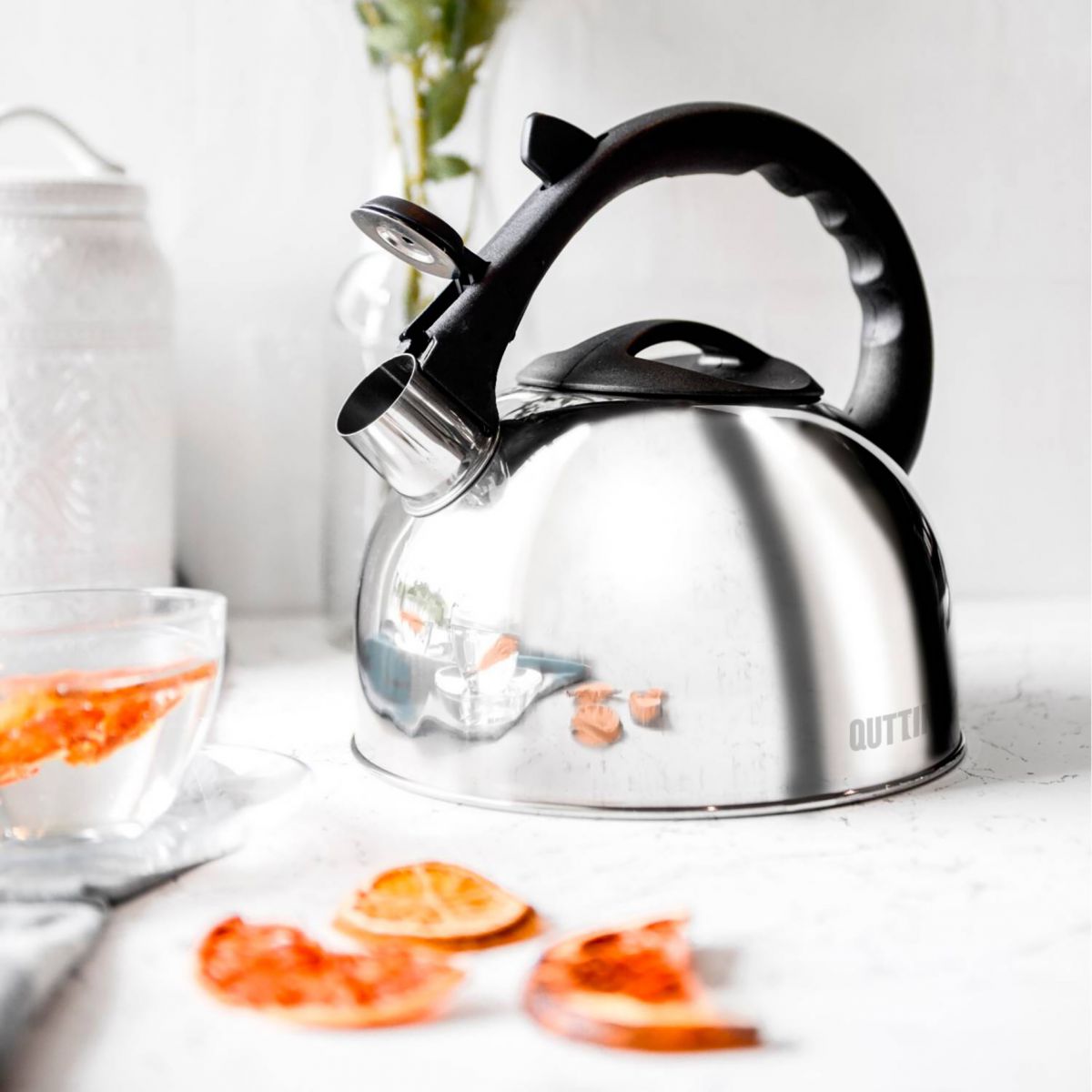 Stainless steel 3L whistling kettle with black handle and spout for induction cooking