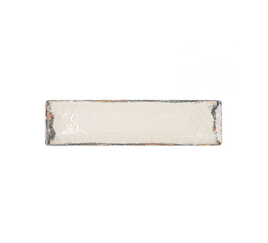 Distressed rectangular ceramic serving tray with creamy white glaze for tapas or sushi