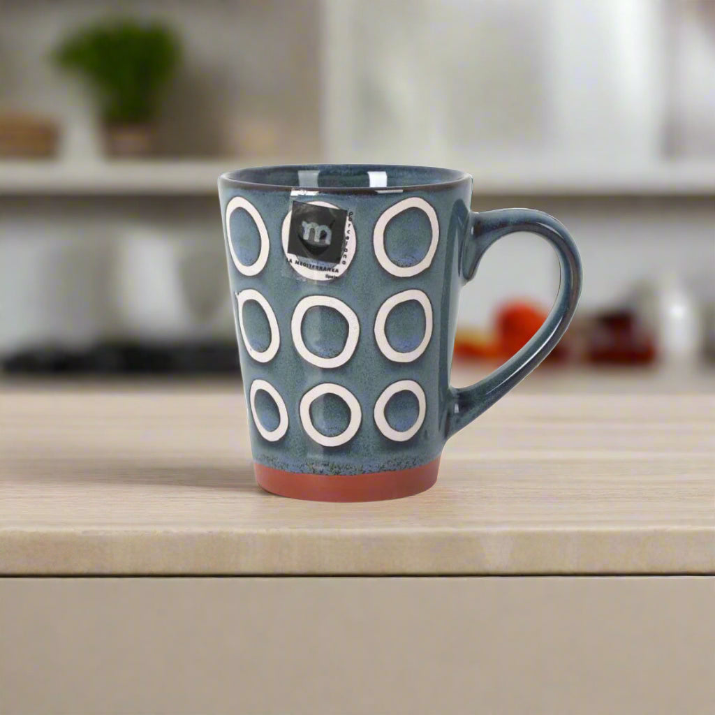 Almudena Blue Coffee Mug 330ml stoneware with white circular patterns and reddish-brown base