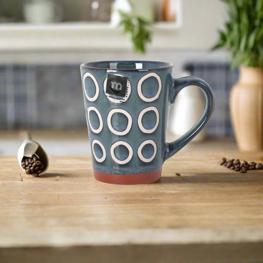 Blue ceramic Almudena coffee mug with white circles and reddish-brown base 330ml