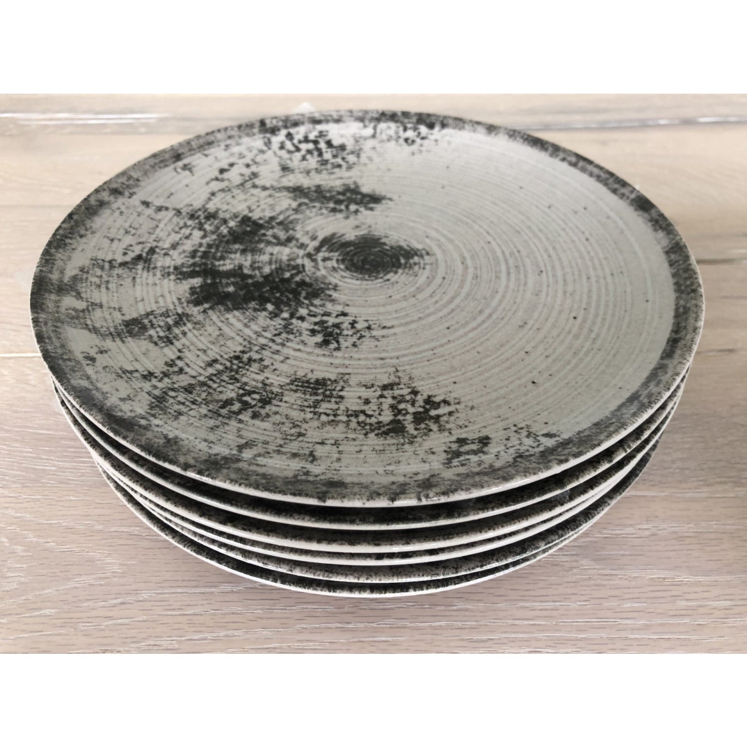 Stack of decorative ceramic plates for Aspe Montecarlo Grey Matt 26cm Dinner Plate