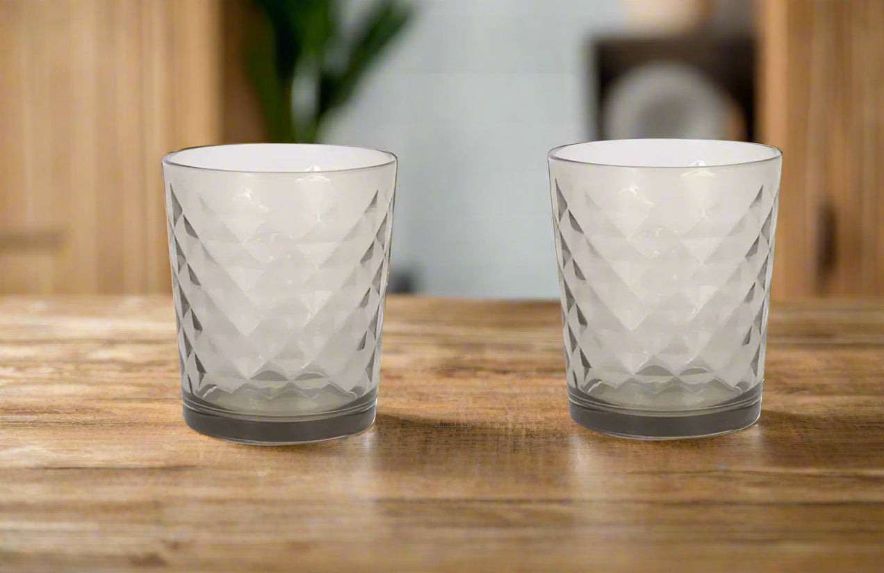 Two clear Axel Diamonds Grey Smoke 360ml drinking glasses with geometric diamond pattern