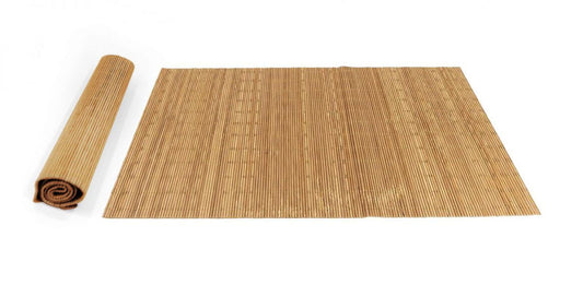 Beige ribbed textured fabric placemats, one rolled and one unrolled, for dining decor