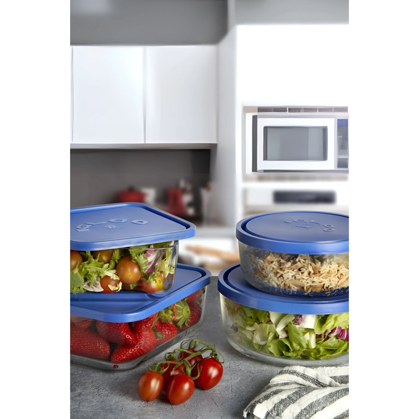 Borgonovo Igloo 800ml rectangular glass container with blue lid, salad greens, strawberries, rice