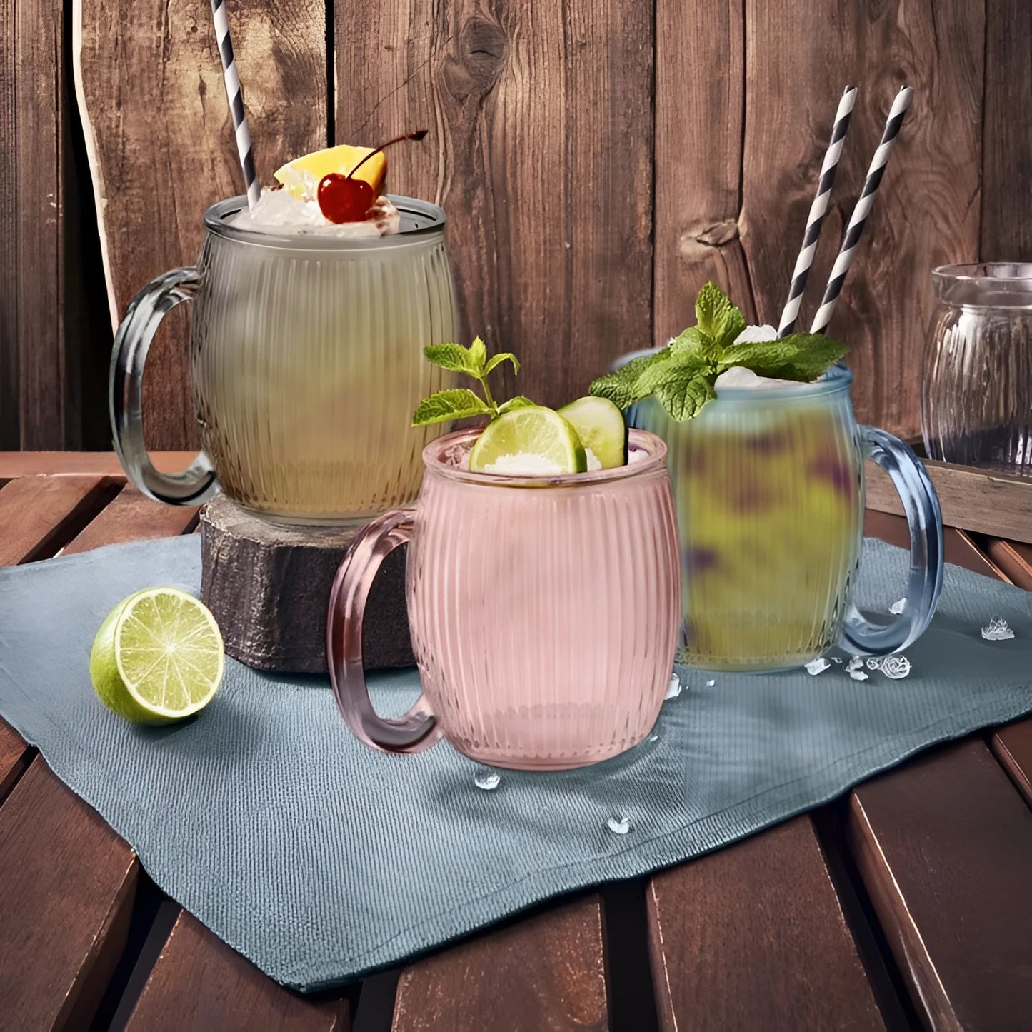 Pink ribbed 350ml cocktail mug with handle, lime and mint garnish