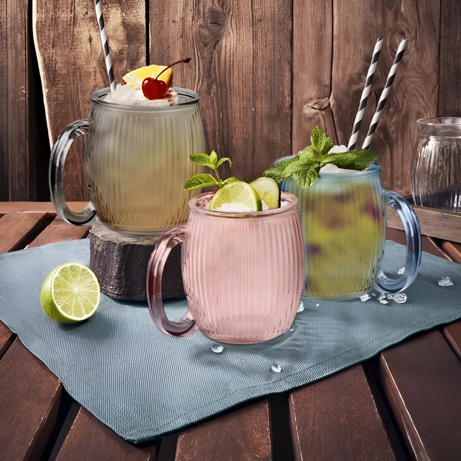Pink ribbed 350ml cocktail mug with handle, lime and mint garnish
