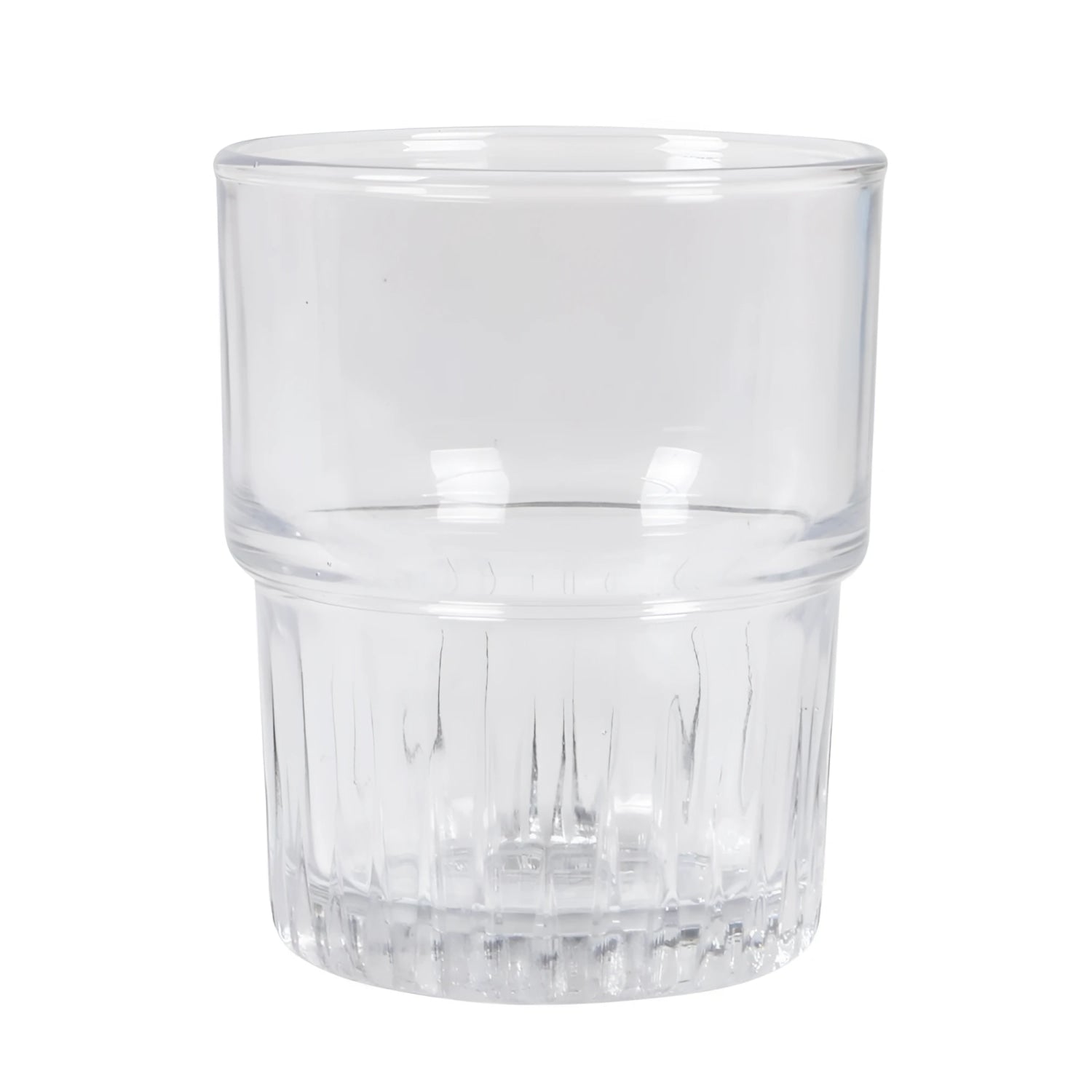 Clear glass tumbler with textured base on a white background duralex