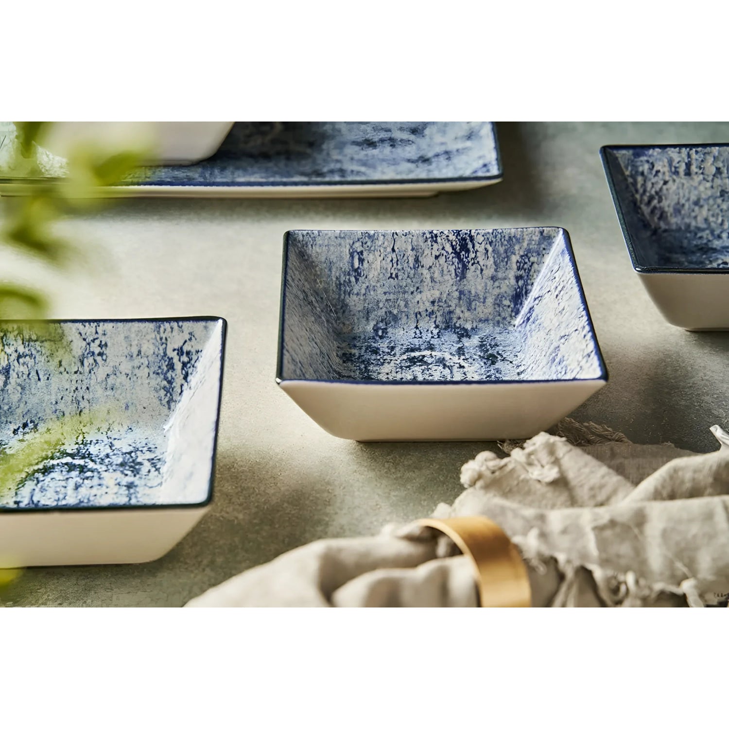 Square ceramic bowls with blue and white textured interiors for Electra 32cm dinner plates