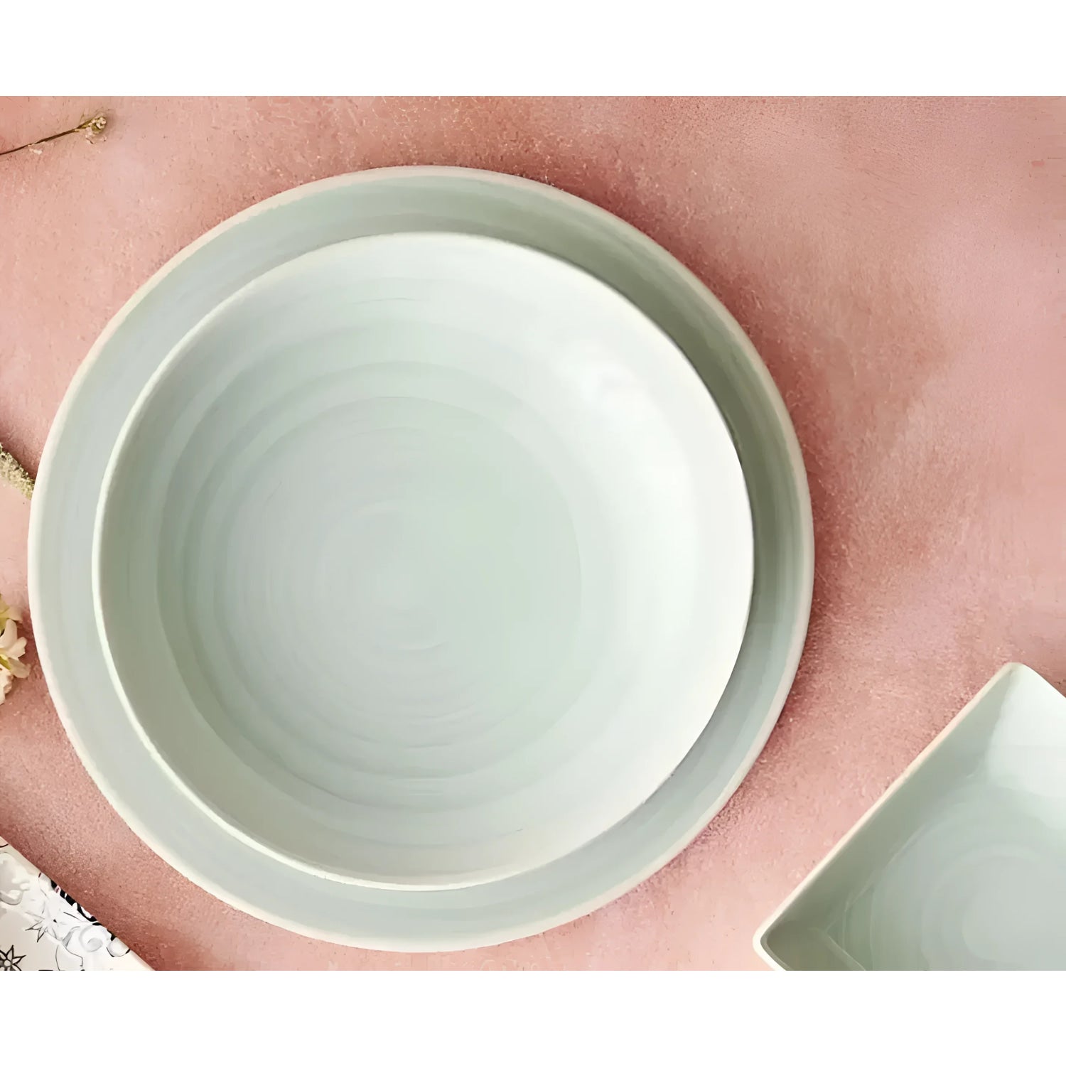 Light blue ceramic plates from Fiji Stoneware for pasta soup and dinner use