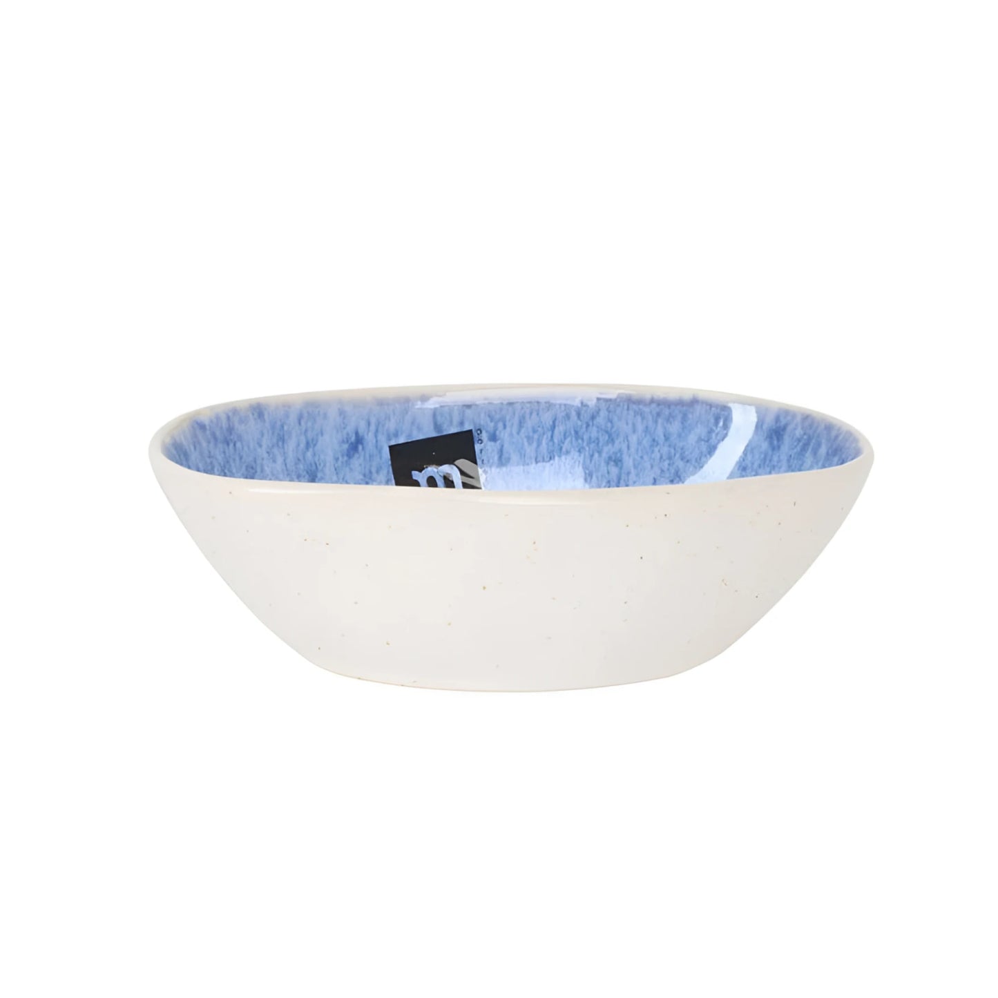 Pica Pica ramekin with creamy white exterior and vibrant blue textured interior