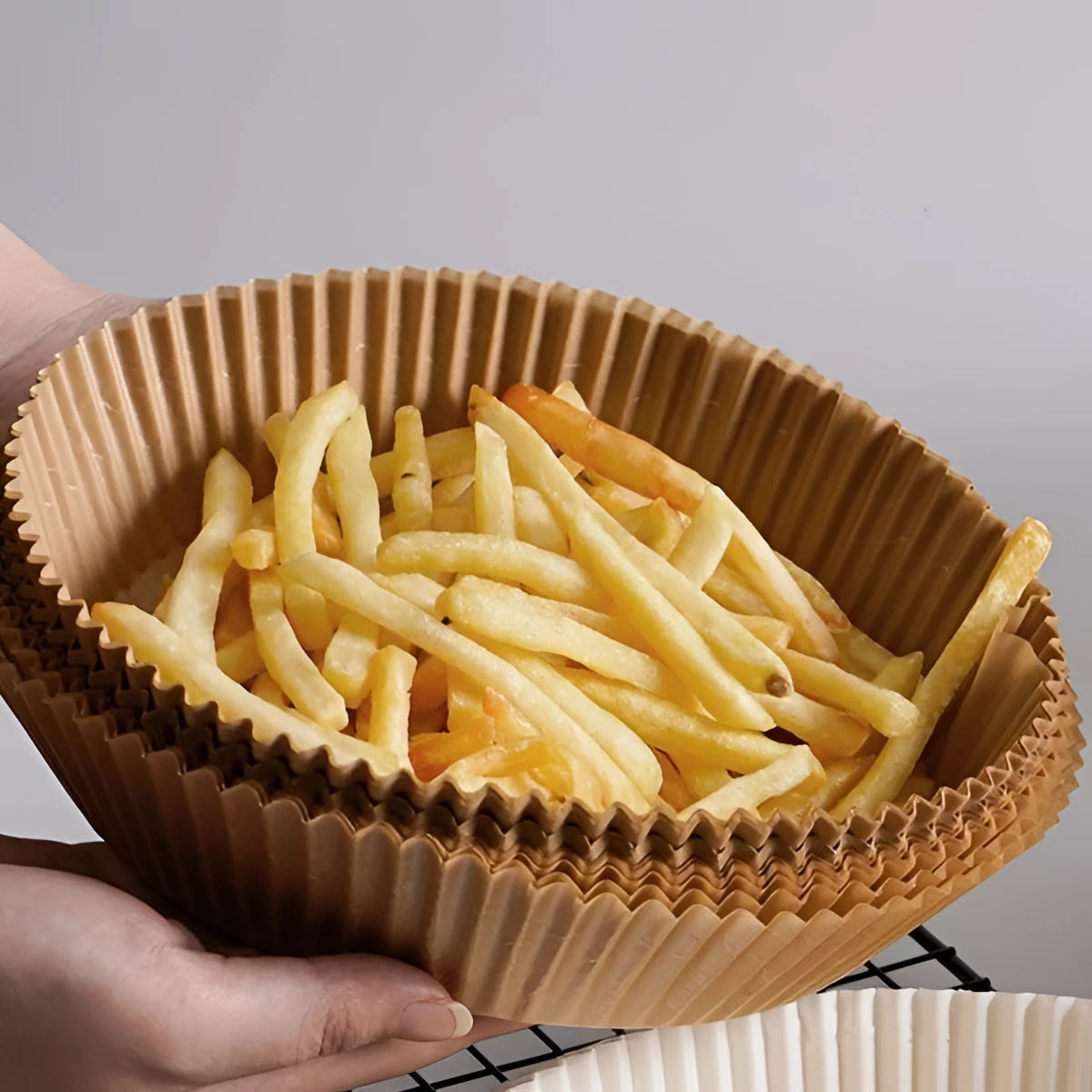 Stack of brown pleated paper baking cups with golden french fries, 20cm x 4.5cm pack of 20