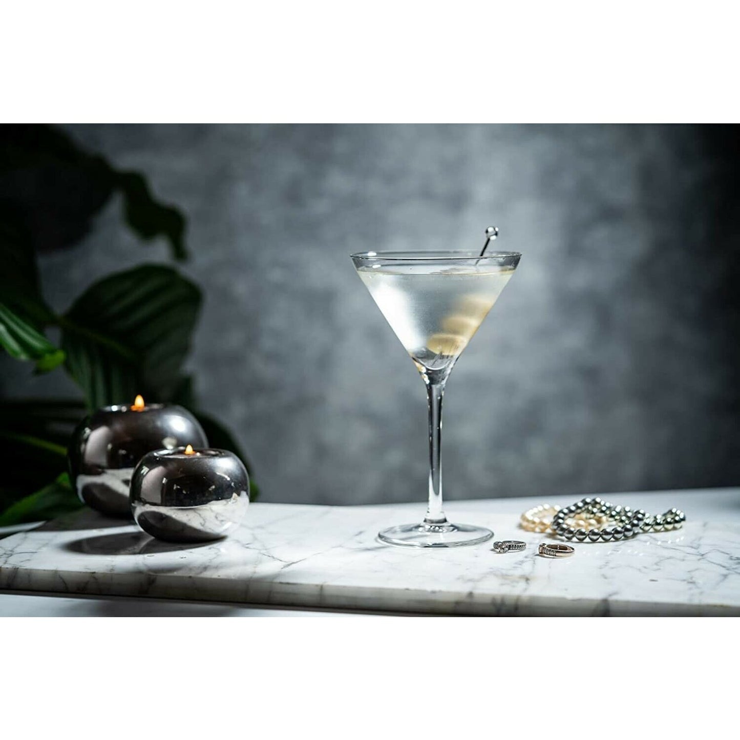 Clear martini with olives on a pick in a Royal Leerdam Specials Cocktails Martini Glass