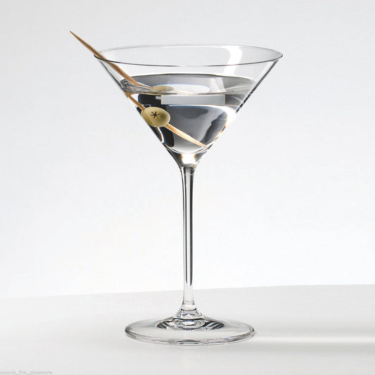 Martini glass filled with beverage and olive garnish in Royal Leerdam Specials Cocktails Glass