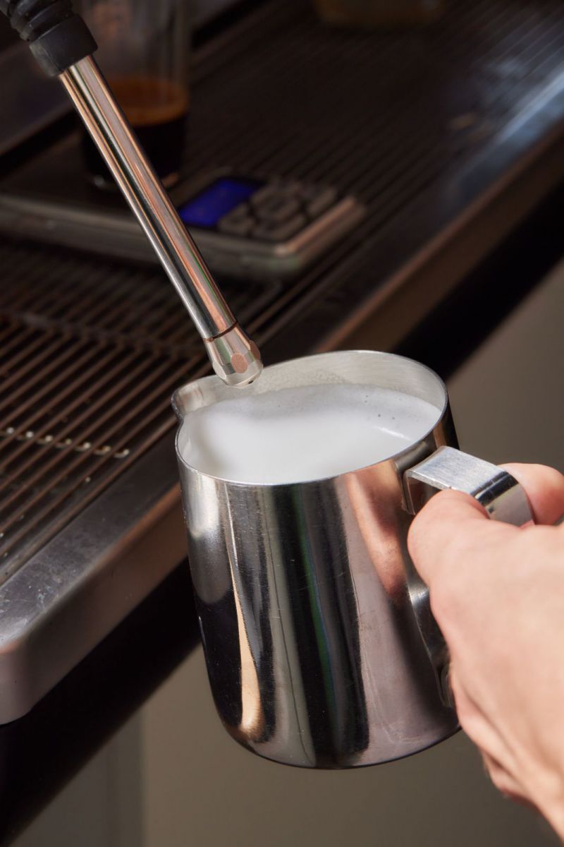 Stainless steel milk frothing pitcher with handle steaming milk for coffee drinks